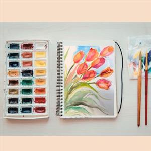 watercolor palette and watercolor tulips painting